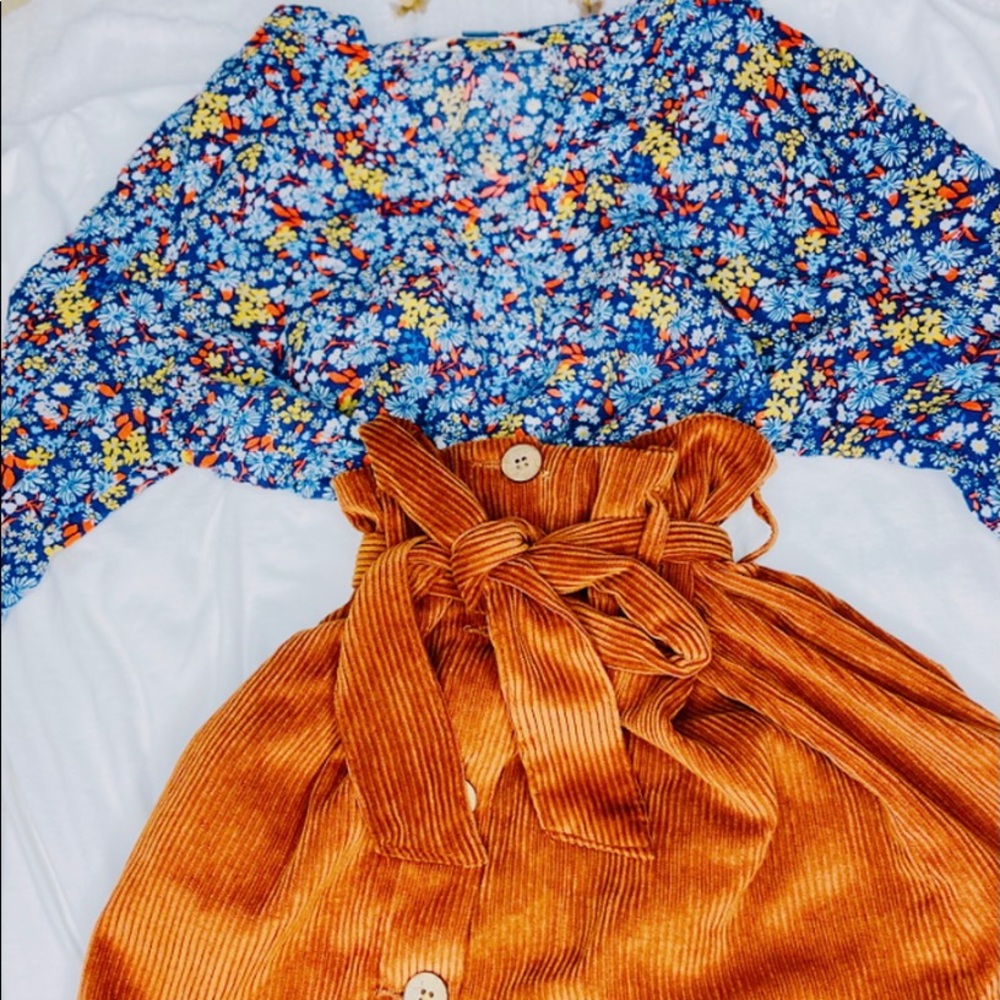 A cute flora shirt perfect for the fall.